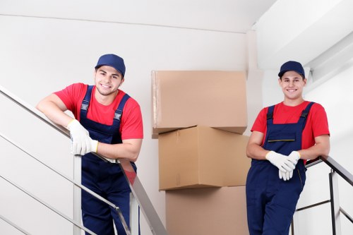 Local movers handling furniture carefully during a Brentcross relocation