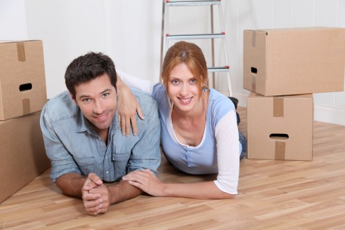Loading furniture and boxes into a van for a Brentcross removal